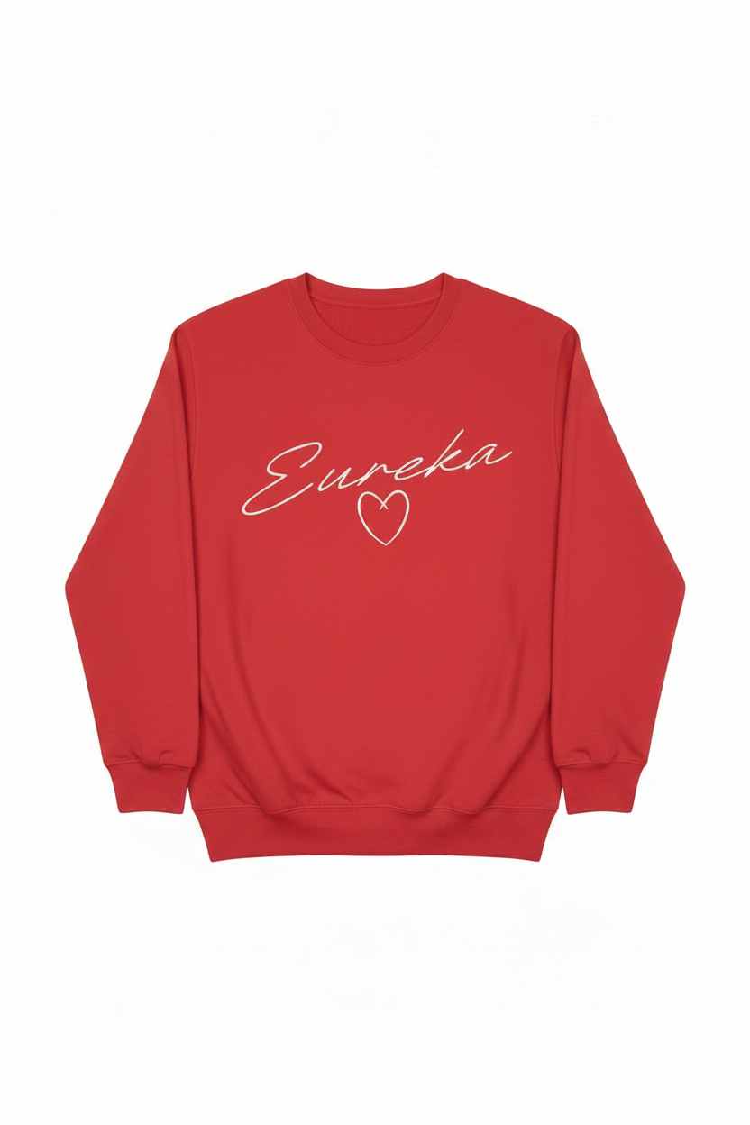 Red crewneck sweatshirt with white Eureka cursive script and white heart outline graphic