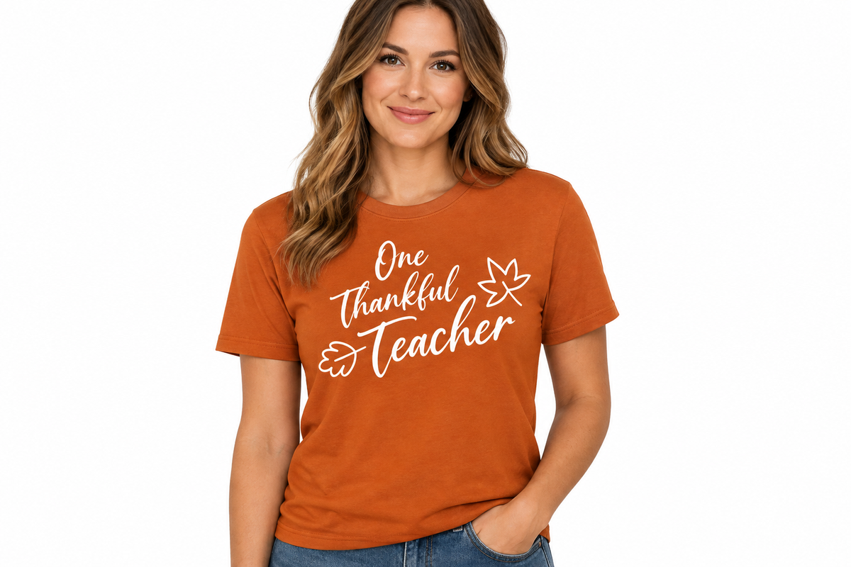 One Thankful Teacher white ink design on autumn burnt orange t-shirt
