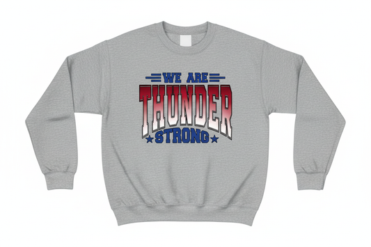 We Are Thunder Strong graphic on heather gray crewneck sweatshirt