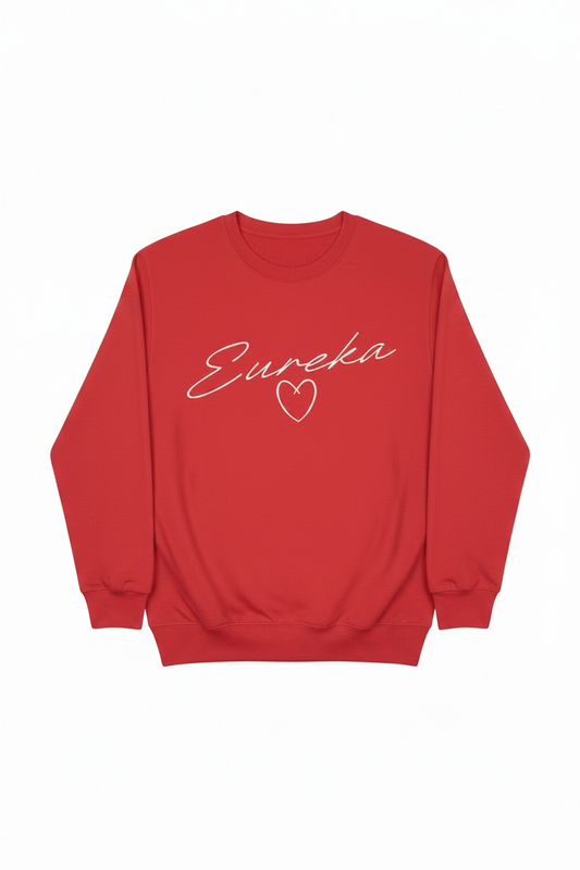 Red crewneck sweatshirt with white Eureka cursive script and white heart outline graphic