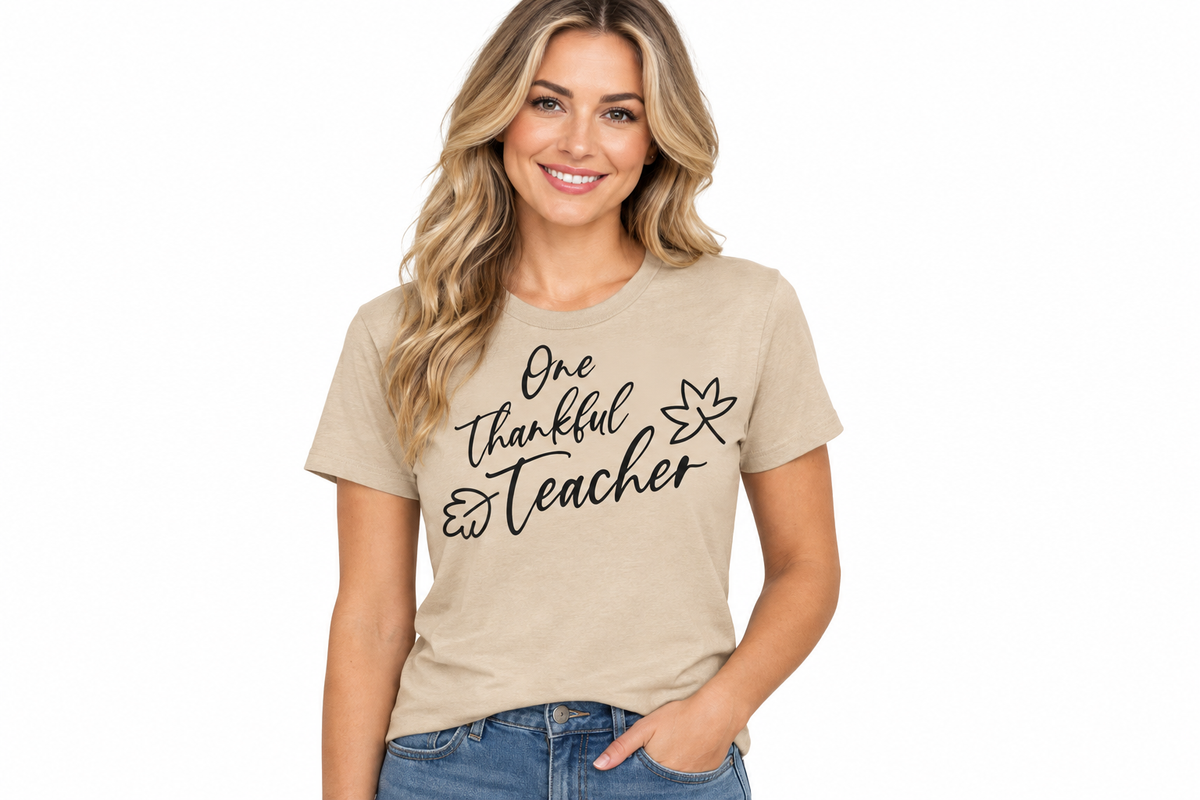 One Thankful Teacher black ink design on sand t-shirt