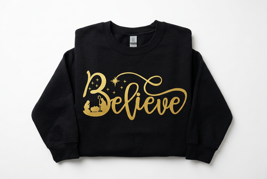 Believe Nativity Crewneck - Black with Gold Print Flat Lay